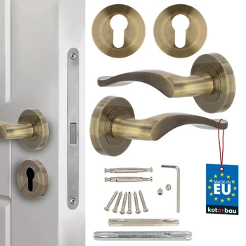 Klamka drzwiowa wewnętrzna krótki szyld dzielony z rozetą na wkładkę patyna