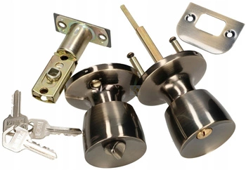 Gałka obrotowa z blokadą do drzwi furtek patyna